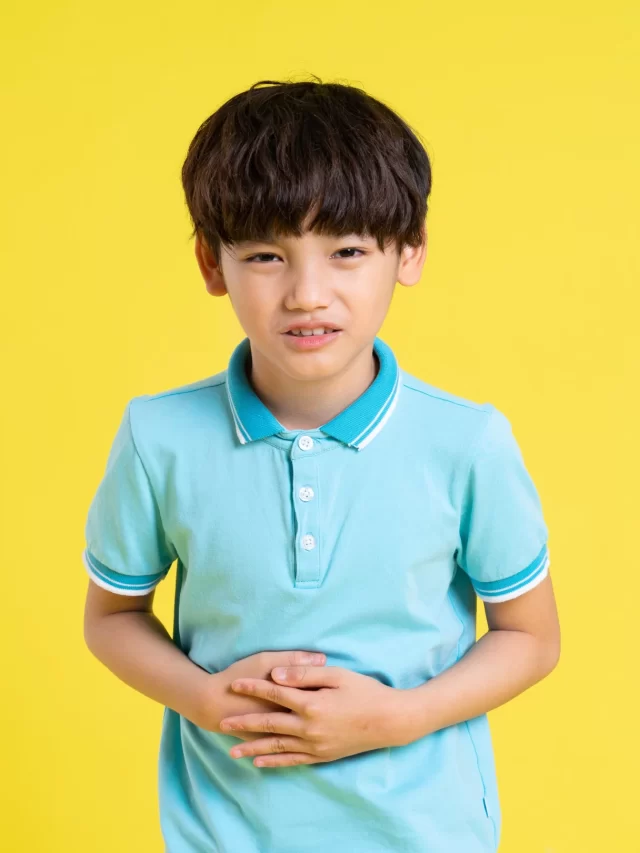 portrait-asian-boy-posing-yellow-background