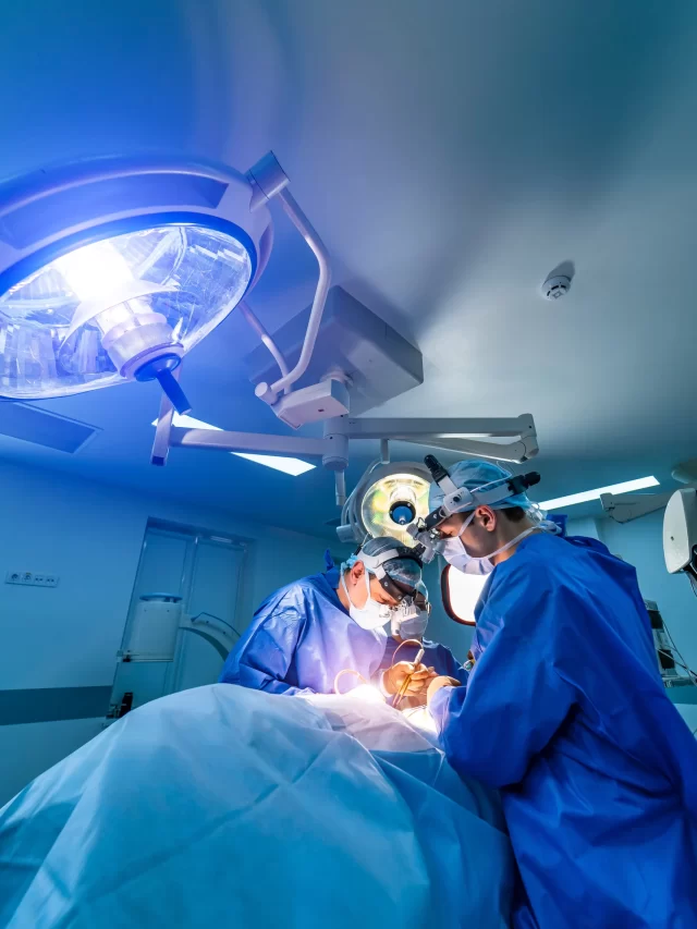 process-surgery-operation-using-medical-equipment-two-surgeons-operating-room-with-surgery-equipment-binocular-glasses
